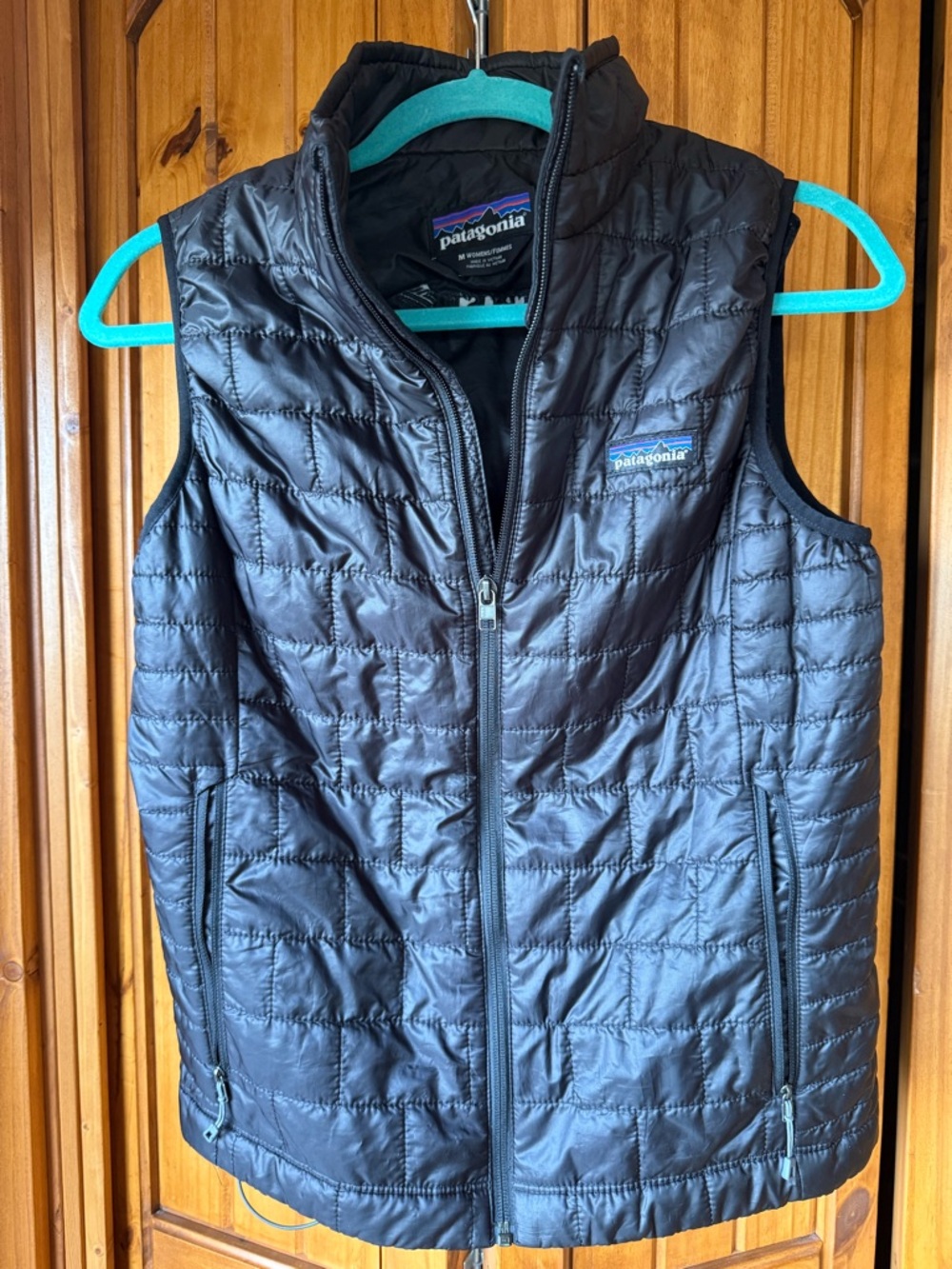 Patagonia Black Quilted Vest with Multicolor Logo